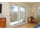 Bright bedroom highlighting access to deck, and natural light at 196 Paces Mill Trl, Pittsboro, NC 27312