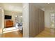 Cozy bedroom features a wooden dresser, large closet and a patio door to the outside at 196 Paces Mill Trl, Pittsboro, NC 27312