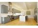 Modern kitchen boasting gray cabinetry, sleek countertops, and stainless steel appliances at 196 Paces Mill Trl, Pittsboro, NC 27312