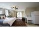 Comfortable bedroom with natural light, bed and rug, offering a serene and inviting space to relax at 196 Paces Mill Trl, Pittsboro, NC 27312
