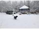 Snow covered yurt with deck and vehicle at 196 Paces Mill Trl, Pittsboro, NC 27312