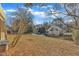 Spacious backyard with a view of neighboring houses at 215 W Chestnut Ave, Wake Forest, NC 27587