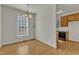 Bright dining area with hardwood floors and chandelier at 215 W Chestnut Ave, Wake Forest, NC 27587