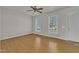 Spacious living room featuring hardwood floors and large windows at 215 W Chestnut Ave, Wake Forest, NC 27587