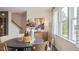 Bright dining area with round table, chairs, and large windows at 2255 Horton Park Dr, Apex, NC 27539