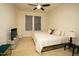 Bedroom showcasing a comfortable bed, a TV on a dresser, and a window for natural light at 248 Begen St, Morrisville, NC 27560