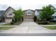 Brick front two-story home with attached two-car garage and landscaping at 248 Begen St, Morrisville, NC 27560