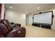 Home theater with leather seating and large screen for entertainment at 248 Begen St, Morrisville, NC 27560