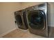 Laundry room with front loading washer and dryer at 248 Begen St, Morrisville, NC 27560