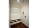 Mudroom with coat hooks, built-in shelving and bench seating at 248 Begen St, Morrisville, NC 27560