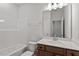 Bathroom with a tub and shower combination, with vanity and mirror at 277 Chesapeake Commons St # 94, Garner, NC 27529