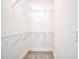 A closet offers adjustable metal shelving and carpet flooring, providing ample space for organization at 2857 Greenbrook Dr, Wendell, NC 27591
