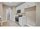 This kitchen features stainless steel appliances and white cabinets at 2857 Greenbrook Dr, Wendell, NC 27591