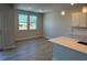 Bright dining area with hardwood floors, natural light, and ample space for entertaining guests at 34 Fairwinds Dr, Lillington, NC 27546