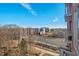 Apartment balcony offering scenic city views and surrounding park at 400 Hunt St # 501, Durham, NC 27701