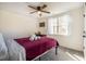 This bedroom features a comfortable bed, modern tv, and ample natural light at 404 Andrews Rd, Durham, NC 27705
