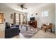 Inviting living room featuring a comfortable seating arrangement, natural light, and elegant decor at 404 Andrews Rd, Durham, NC 27705