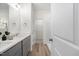 Double vanity bathroom with gray cabinets and white countertop at 435 Iris Bryant Rd, Dunn, NC 28334