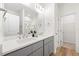 Double vanity bathroom with gray cabinets and white countertop at 435 Iris Bryant Rd, Dunn, NC 28334
