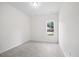 Spacious bedroom with a window and carpet at 435 Iris Bryant Rd, Dunn, NC 28334