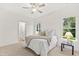 Spacious bedroom with ceiling fan and ample natural light at 435 Iris Bryant Rd, Dunn, NC 28334