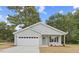 Charming one-story home with gray siding, white trim, and a two-car garage at 435 Iris Bryant Rd, Dunn, NC 28334