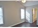 Spacious bedroom with dark floors, and plenty of natural light at 5016 Parkerwood Dr, Knightdale, NC 27545