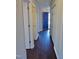 Inviting entryway with dark floors and a blue door at 5016 Parkerwood Dr, Knightdale, NC 27545