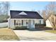 Charming one-story house with a front porch and landscaped yard at 5016 Parkerwood Dr, Knightdale, NC 27545