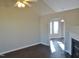 Living room with hardwood floors, vaulted ceiling and a fireplace at 5016 Parkerwood Dr, Knightdale, NC 27545