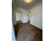 Bright hallway with durable wood flooring, neutral colors, and smooth transitions at 524 Gainer Dr # 7, Raleigh, NC 27610