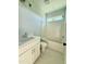 Cozy bathroom featuring a shower-tub combo and modern vanity at 5377 River Buck Rd, Spring Hope, NC 27882