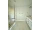 Bathroom with tile flooring, vanity with sink, and tiled walk-in shower with built in seat at 5377 River Buck Rd, Spring Hope, NC 27882