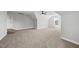Large bonus room featuring plush carpet, a ceiling fan, and bright windows offering exterior views at 5377 River Buck Rd, Spring Hope, NC 27882