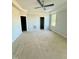 Spacious main bedroom with a ceiling fan, neutral walls, and lots of natural light at 5377 River Buck Rd, Spring Hope, NC 27882