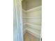 Walk-in pantry with multiple shelves for optimal storage and organization at 5377 River Buck Rd, Spring Hope, NC 27882