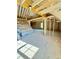 Unfinished room showcasing exposed framing and insulation, offering a blank canvas for creating a personalized space at 5377 River Buck Rd, Spring Hope, NC 27882