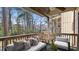 Relaxing balcony with wooded views and seating at 550 Pine Ridge Pl, Raleigh, NC 27609