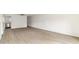 Simple dining area with wood-look floors and access to kitchen at 550 Pine Ridge Pl, Raleigh, NC 27609