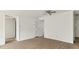 Living room with wood-look floors and neutral-colored walls at 550 Pine Ridge Pl, Raleigh, NC 27609