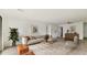 Bright living room with comfy seating and large windows at 550 Pine Ridge Pl, Raleigh, NC 27609