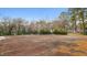 Community tennis court needing some repair at 550 Pine Ridge Pl, Raleigh, NC 27609