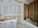 Bathroom with a bathtub and modern vanity at 5820 Shawood Dr, Raleigh, NC 27609