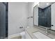 Bathroom with subway tile and a vanity with modern fixtures at 5820 Shawood Dr, Raleigh, NC 27609