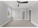 Bedroom featuring recessed lighting, a ceiling fan and an open door to the bathroom at 5820 Shawood Dr, Raleigh, NC 27609