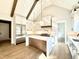 Modern gourmet kitchen featuring stainless steel appliances, and a large island at 5820 Shawood Dr, Raleigh, NC 27609