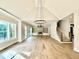Spacious living room features a fireplace, built-in shelving, and hardwood flooring at 5820 Shawood Dr, Raleigh, NC 27609