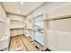 Spacious walk-in closet with custom shelving and ample storage for all your wardrobe needs at 5820 Shawood Dr, Raleigh, NC 27609