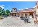 Community patio with seating and fireplace at 72 Florentino Ct, Clayton, NC 27527