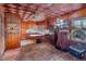 Kitchen with wood cabinets and checkered ceiling at 73 Brake Rd, Rocky Mount, NC 27801